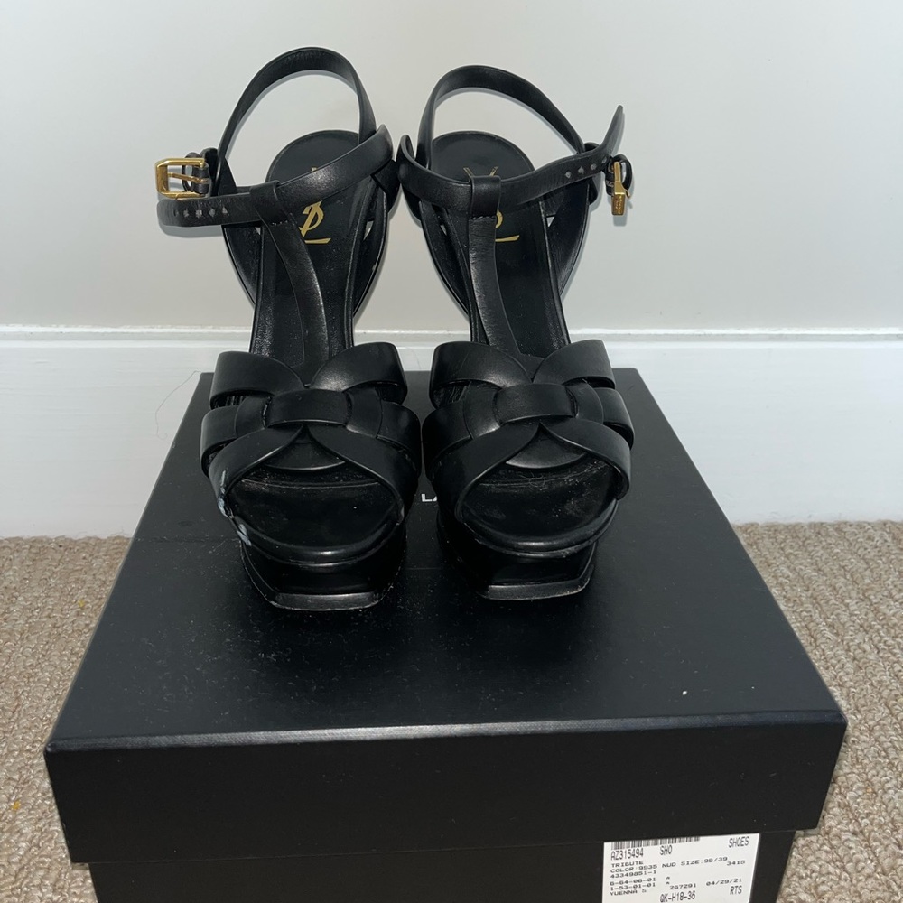 Yves Saint Laurent black tribute heels in a size 38